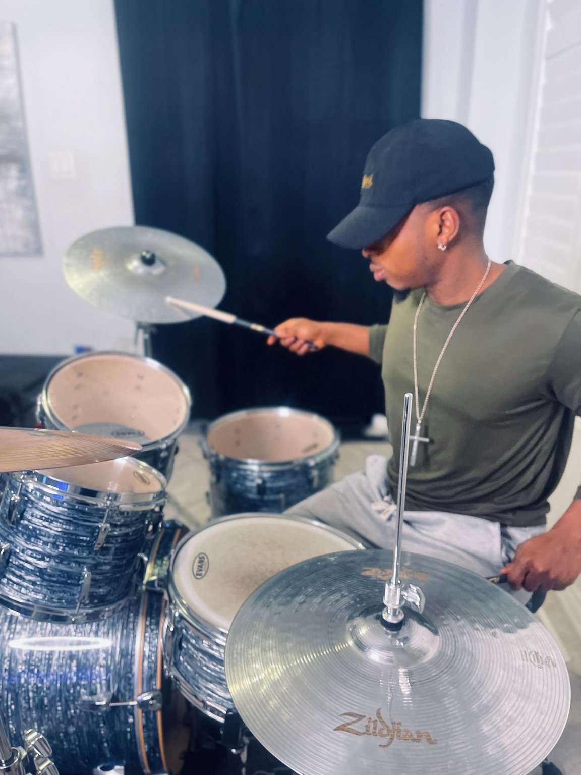 Mo-Izz playing drums